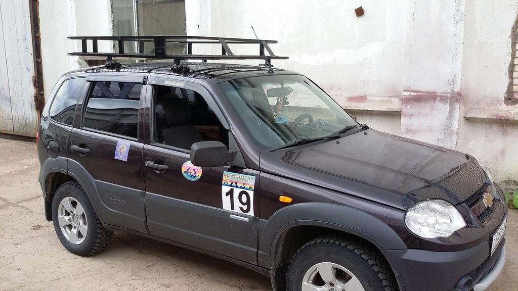 Багажник на ниву шевроле. Экспедиционный багажник на ниву Шевроле. Chevrolet Niva багажник. Багажник на крышу Нива Шевроле экспедиционный. Багажник экспедиционник на Шевроле ниву.